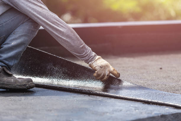 Professional Basement Waterproofing technician working in Falls Church, VA
